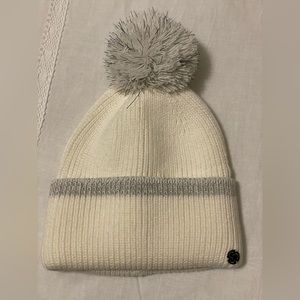 Zella ivory cloud reflective Pom Pom beanie.